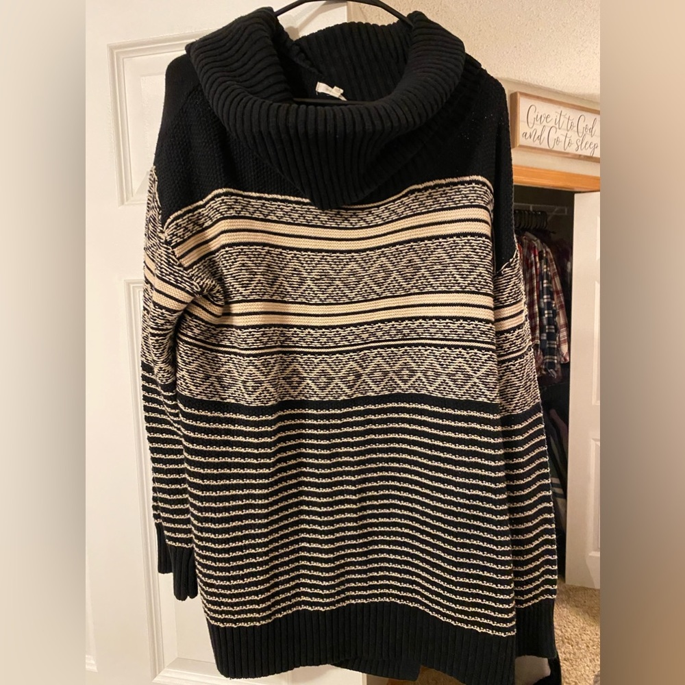 Black and cream sweater